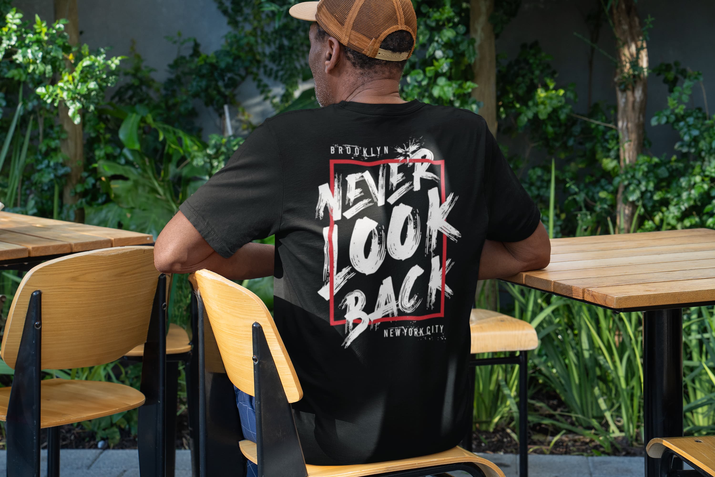 Unisex Relaxed Fit T-Shirt with "Never Look Back" Print